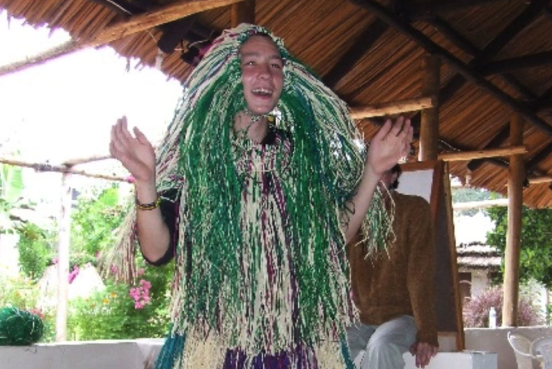 Uganda 2008 : Enjoying some down time being shown how to make some traditional grass skirts